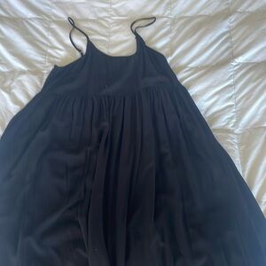 Woman’s thin black maxi dress